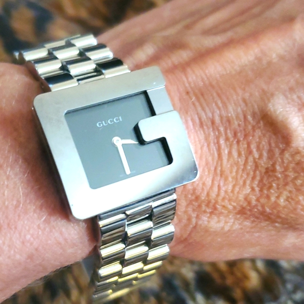Authentic Gucci womans G Shape stainless steel watch